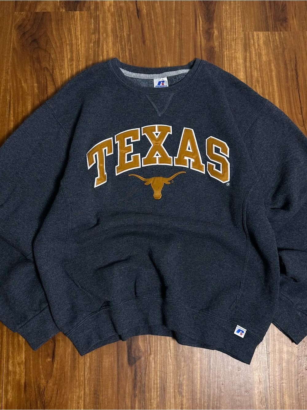 Russell Athletic Charcoal Crewneck Sweatshirt with orange Texas Logo